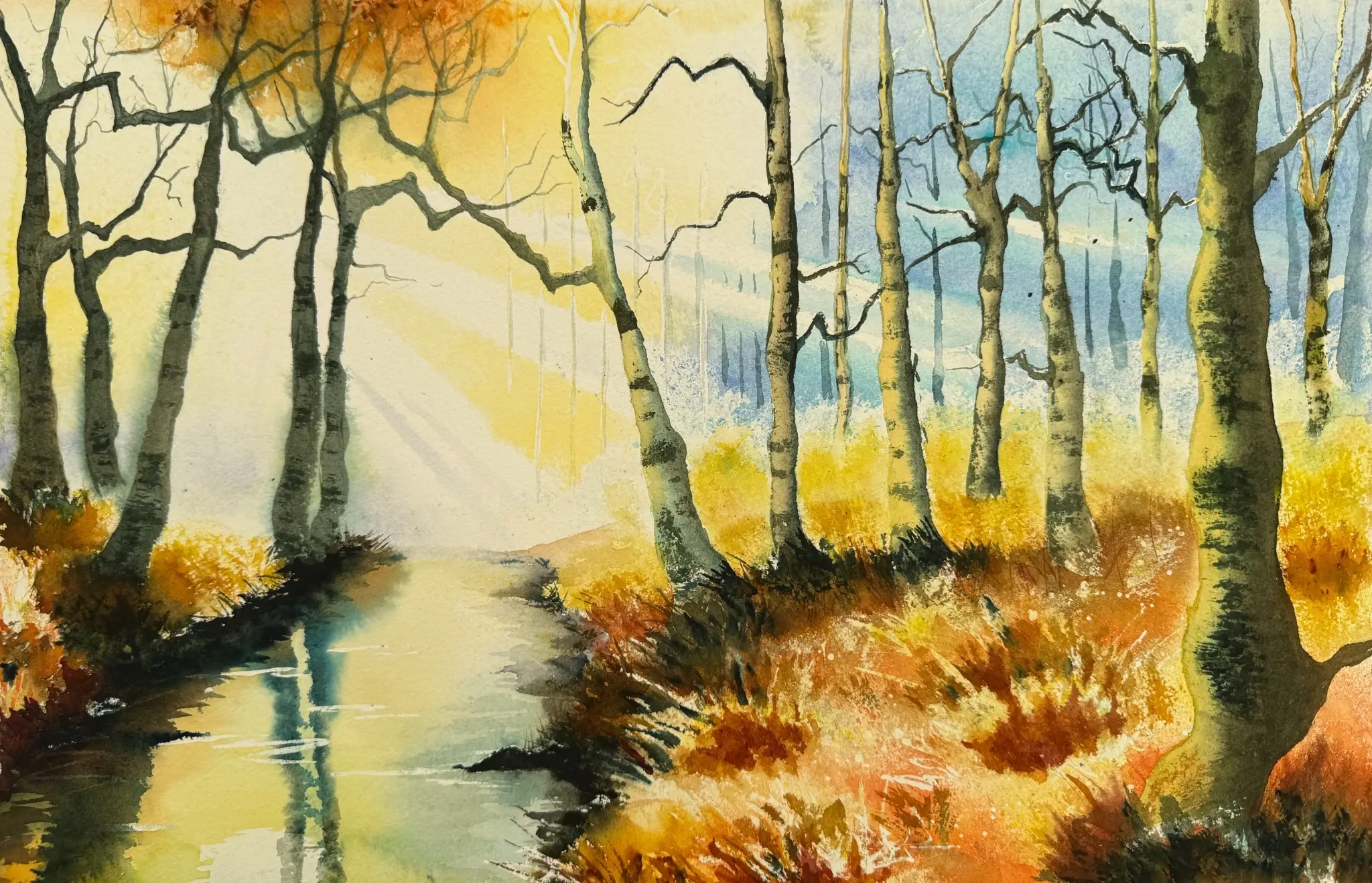 Dreaming In BirchLight watercolour painting showing a golden birch woodland with warm reflections and soft green light.